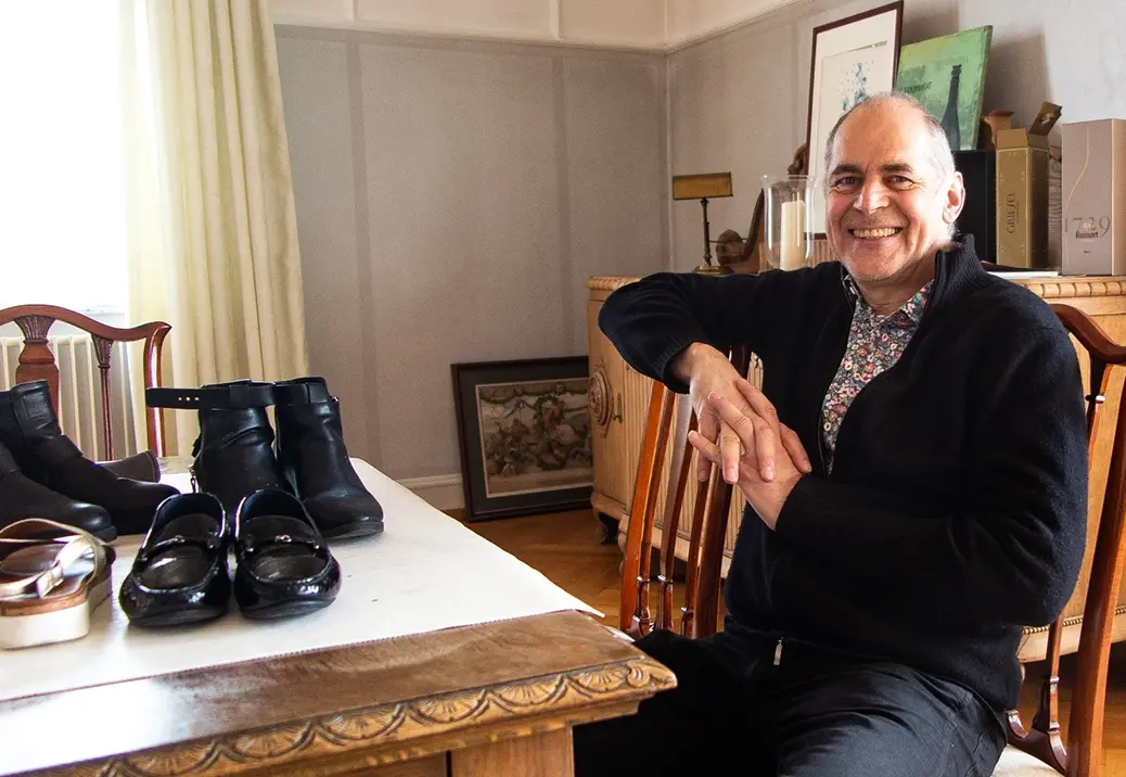 Volker Raumland with his shoes and furniture