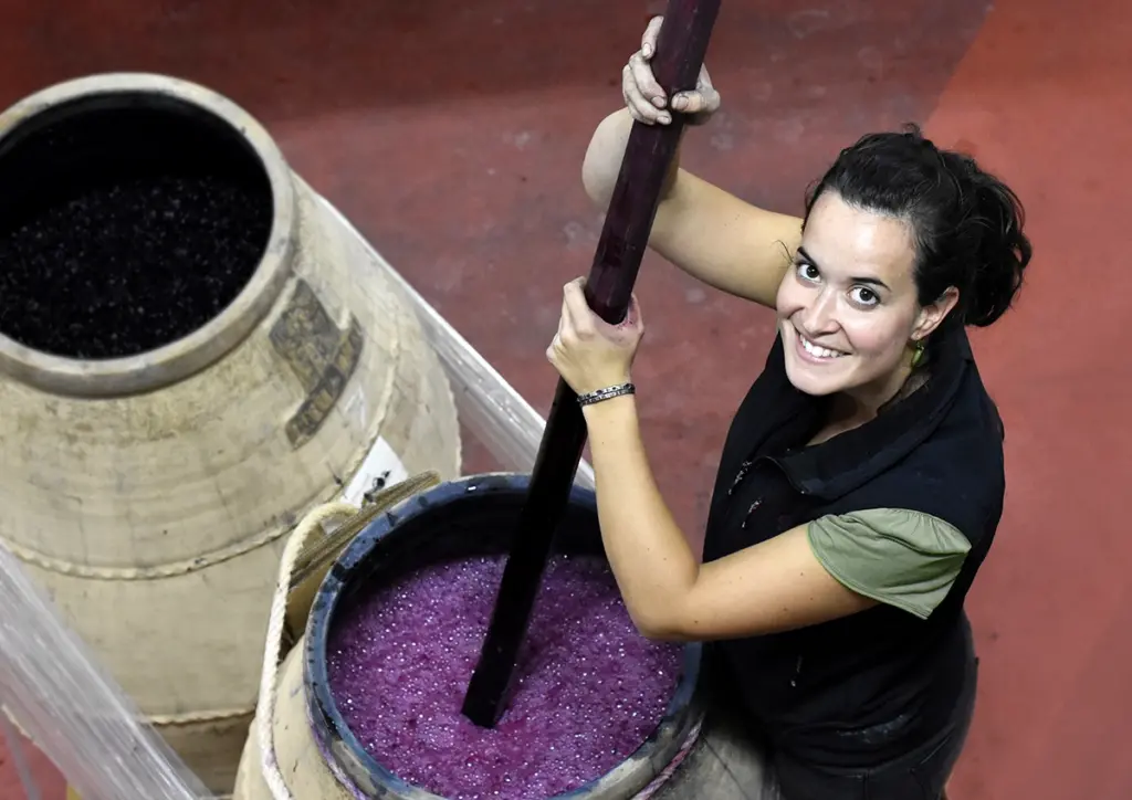 Sandra Bravo  of Sierra de Toloño working with Garnacha grapes in Rioja