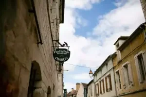 Chablis street with winemaker's sign