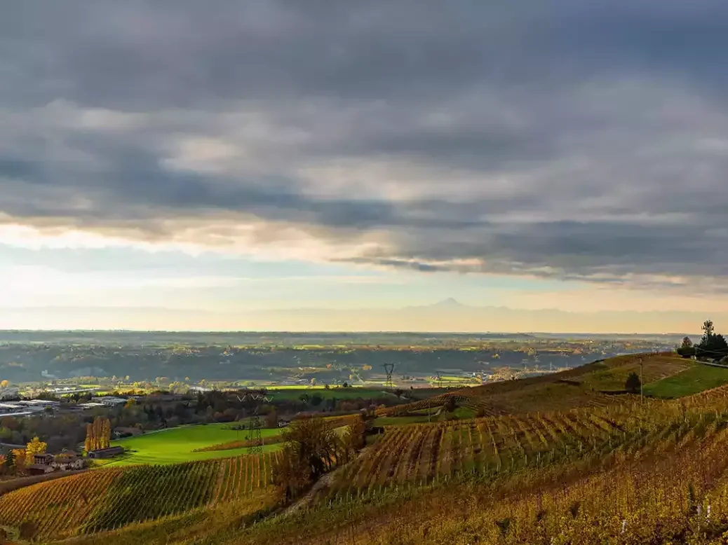 Barolo vineyards with rain clouds