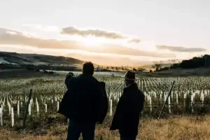 Nick Glaetzer and Gerald Ellis looking out over the Glaetzer-Dixon vineyard in Tasmania.