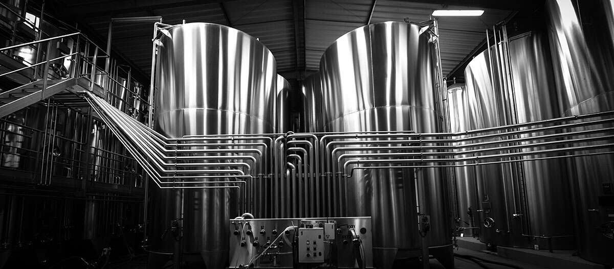 Stainless steel tanks, often used in wineries thought of as subscribing to modernism