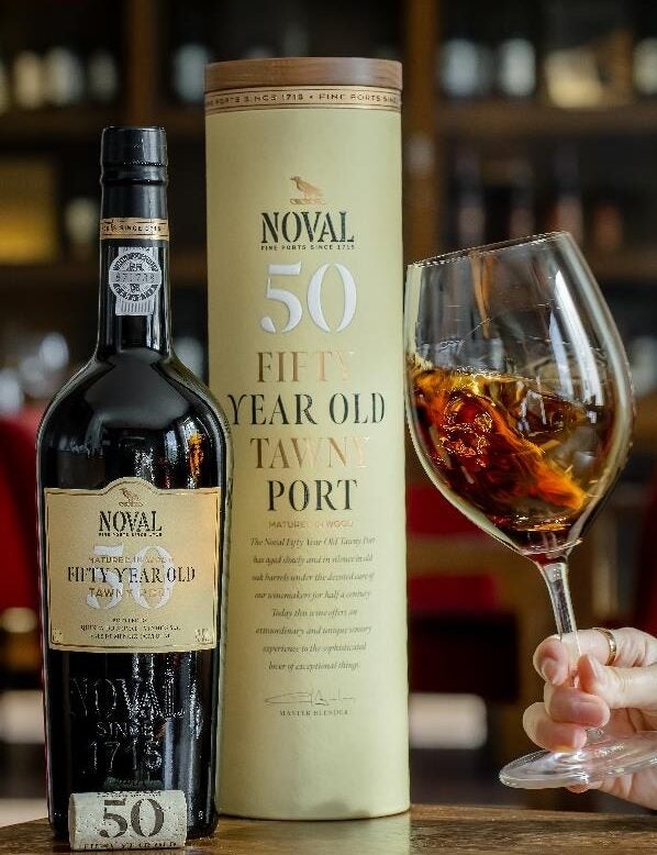 A bottle, box , and glass of Quinta do Noval 50 Year Old Tawny Port