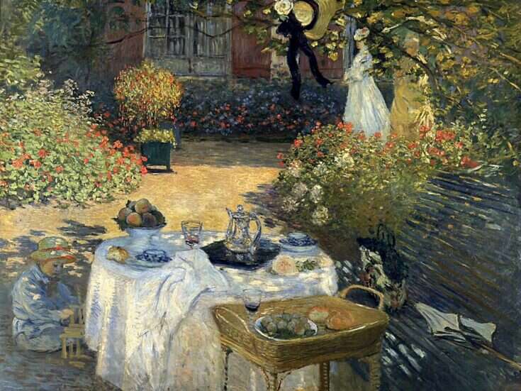 An impressionist painting of a table with white tablecloth laid with food and jugs of water and wine in dappled sunlight in a pretty garden with a child sitting on the floor by the table and a man and two women standing in the background in front of a window