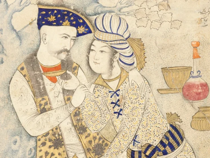 A painting of a near-eastern man and a possibly east asian woman featured on the cover of Vins d'Orient. She is holding a cup to his chin, a round-bottomed bottle of wine is pictured to the side