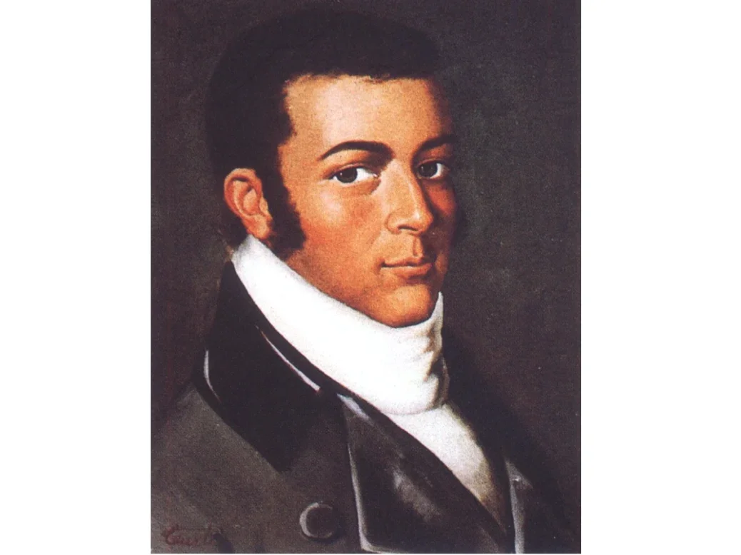 A painted portrait of Dr. Eduard Löbenstein-Löbel with dark hair and long dark sideburns with white scarf and a dark jacket