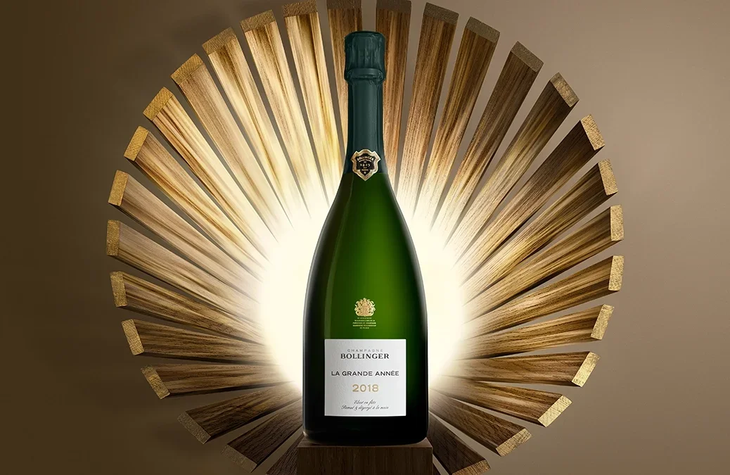 A bottle of Bollinger photographed with a shell background