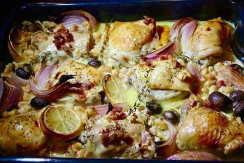 An above view of coq au Riesling cooked in a deep dish