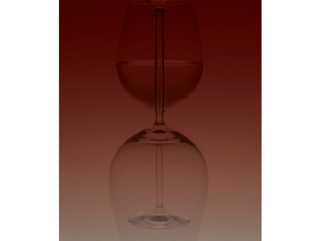 Two wine glasses superimposed on top of each other with a red tint
